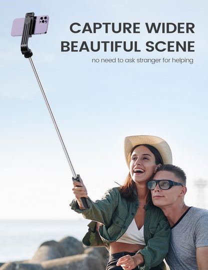ANXRE 41.7-inch extendable selfie stick and tripod capturing a couple outdoors with scenic mountain and lake background views using the wireless remote