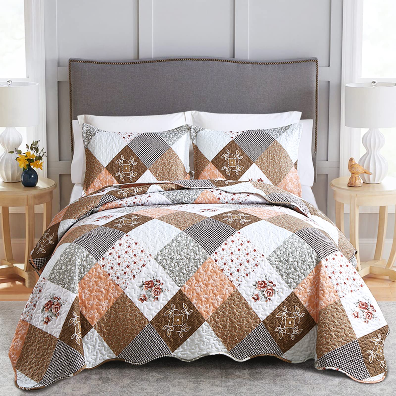 Dinjoy Boho Patchwork Floral Quilt Bedding Set in Brown displayed on a bed