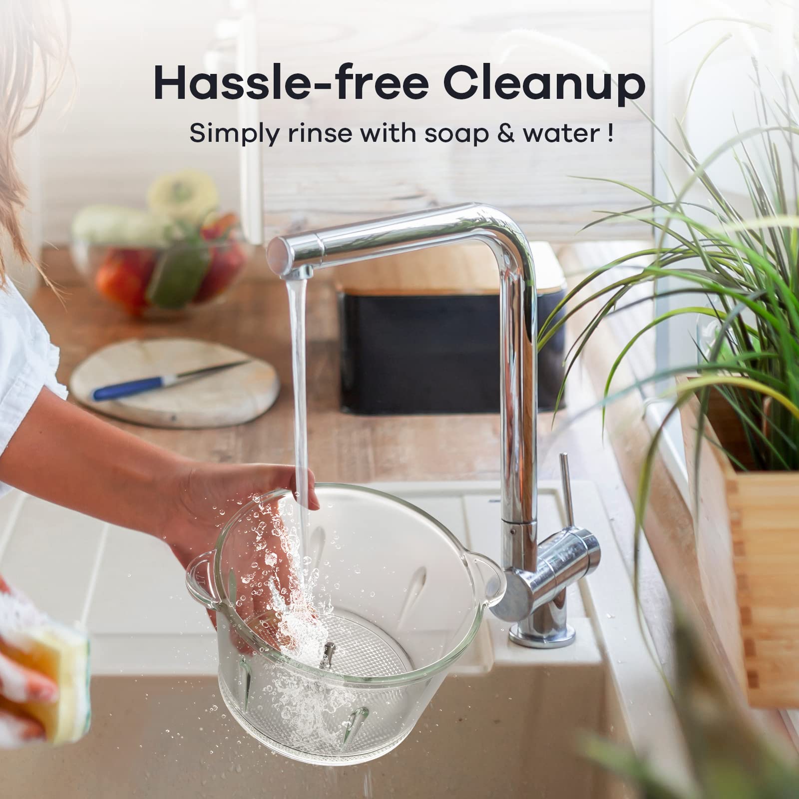 Ganiza food processor showing hassle-free cleanup with a glass bowl being easily rinsed under the kitchen faucet