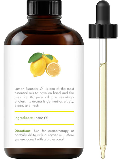 Handcraft Blends Lemon Essential Oil in a dark amber glass bottle with a yellow label showing lemons. Label reads '100% Pure & Natural, Cold Pressed, 4 FL OZ (118 ML).' A glass dropper is shown alongside.