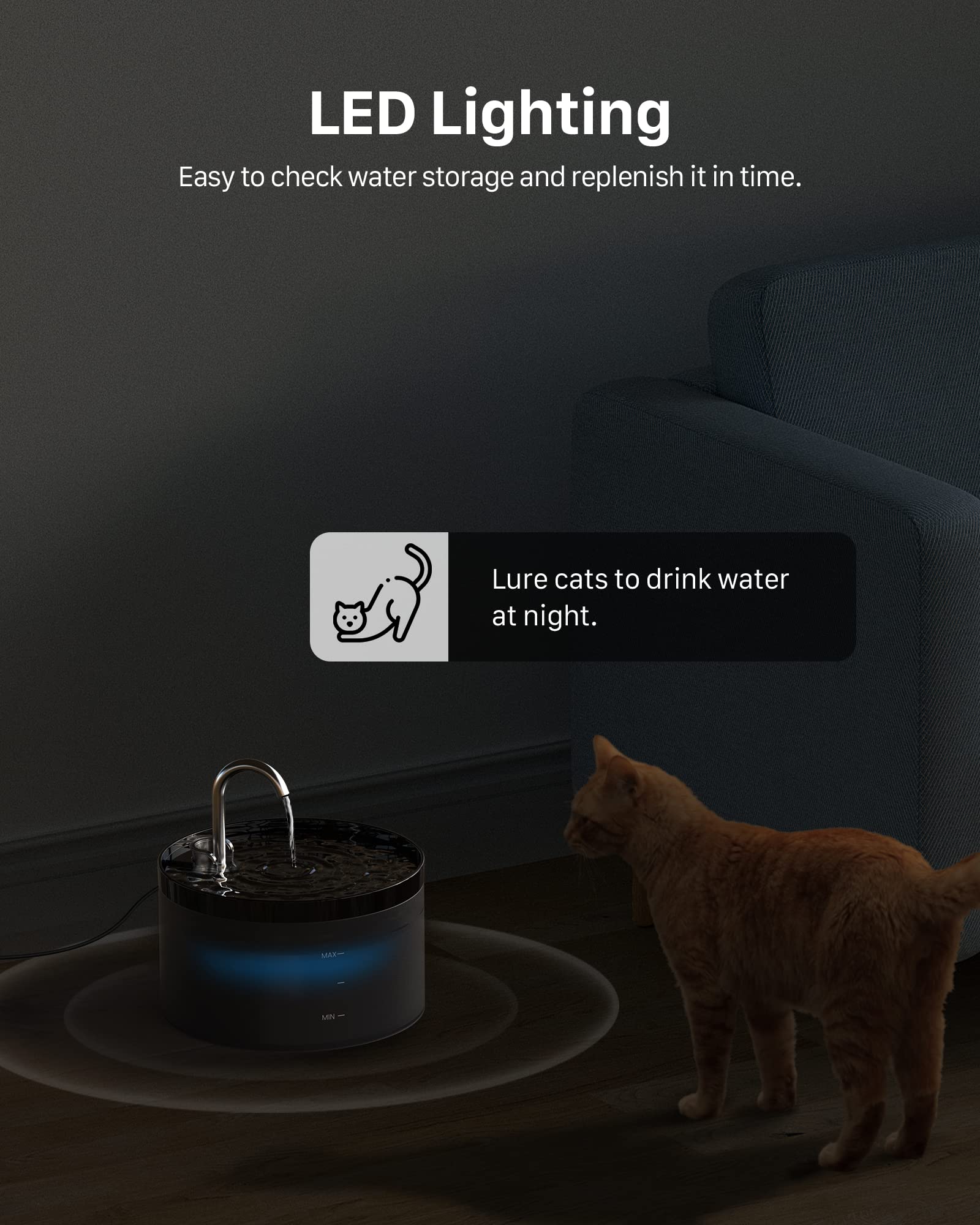 Cat drinking water from a pet fountain with LED lighting in a dark room.