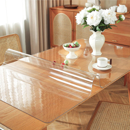 OstepDecor Clear Table Protector 30 x 72 Inch on Wooden Table, showing high transparency and protective features against spills and scratches for furniture.