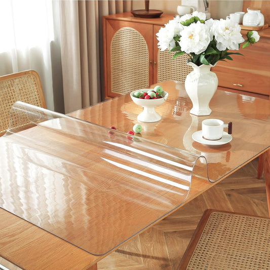 OstepDecor Clear Table Protector 30 x 72 Inch on Wooden Table, showing high transparency and protective features against spills and scratches for furniture.