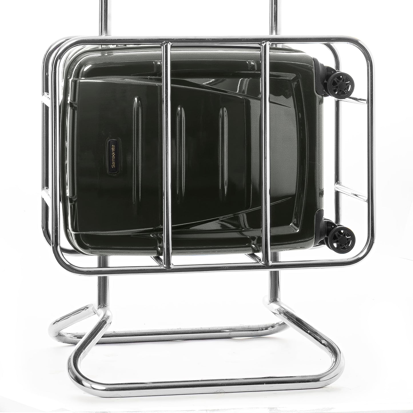Samsonite Winfield 2 20-inch carry-on luggage fitting inside an airline overhead bin sizer cage