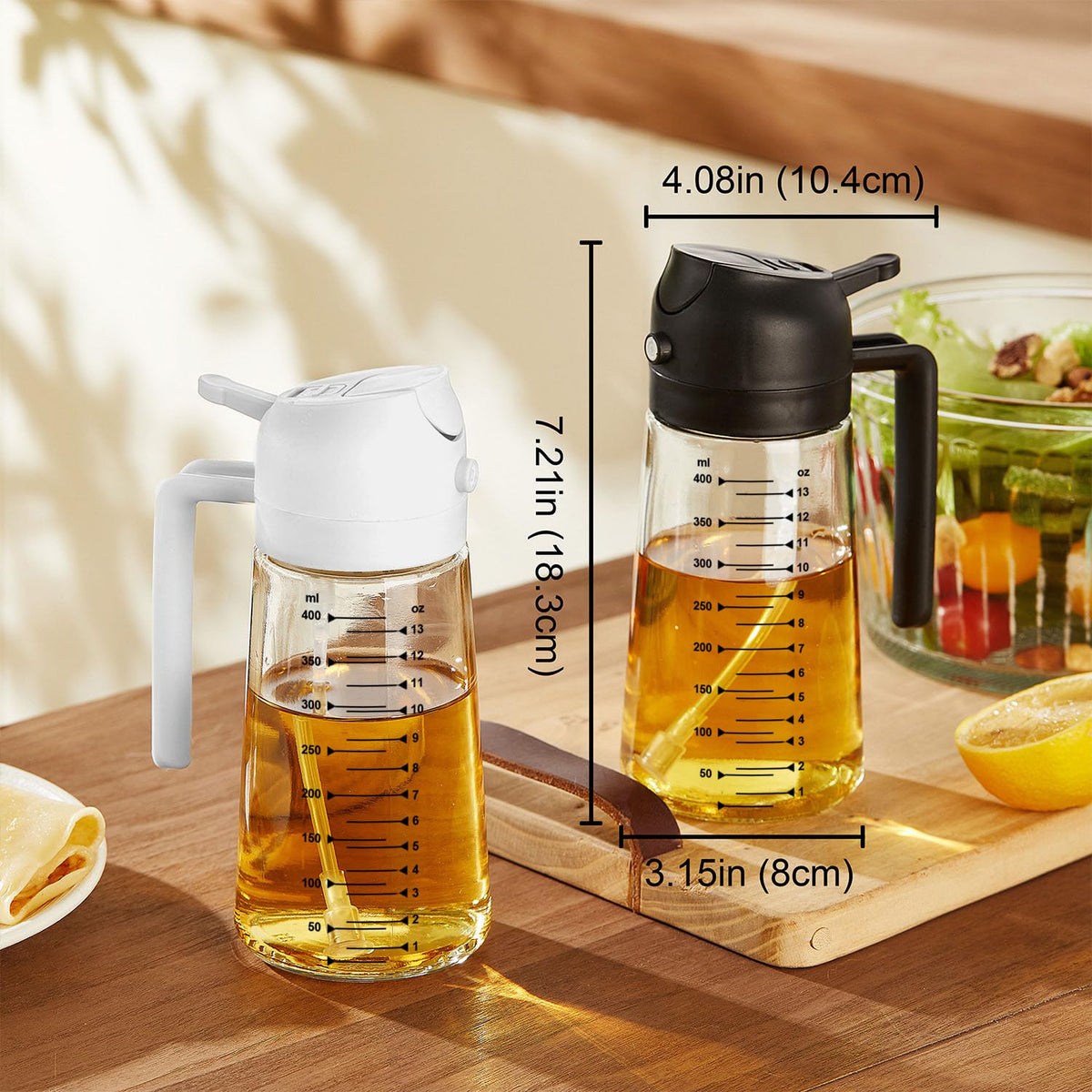 TrendPlain 470ml 2-in-1 glass oil spray bottle showing product dimensions, height 18.3cm, and clear volume measurement scale marks