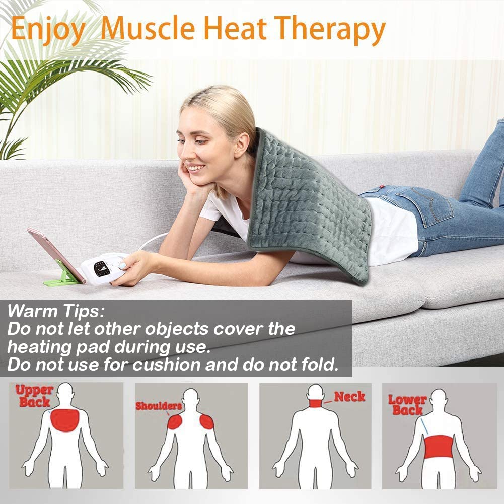Woman relaxing on sofa using VANKADA electric heating pad for muscle heat therapy on back and shoulders